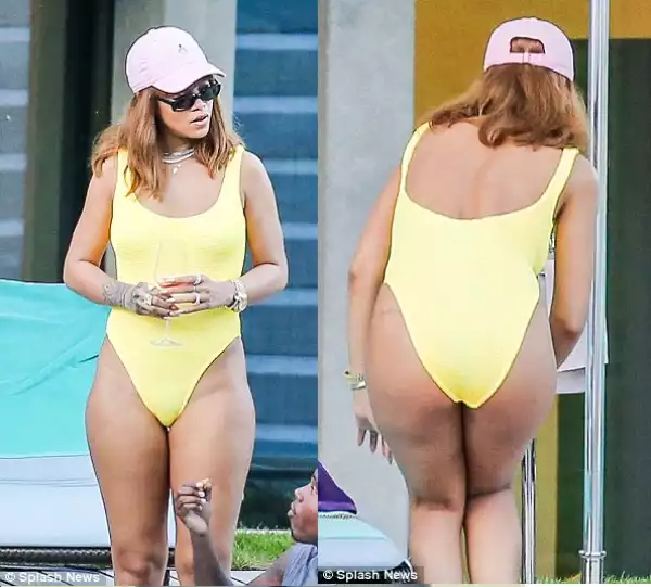 The body on Rihanna! See lovely beach photos of her in yellow swimsuit (Photos)